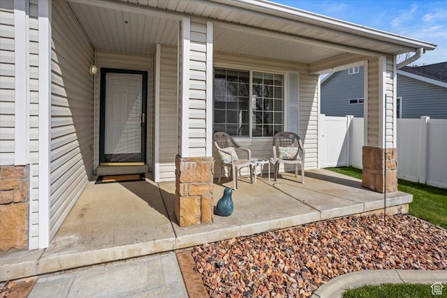 5448 S 4025 W, Roy, UT 84067 - property entrance with covered porch and fence