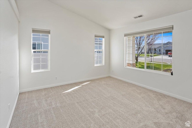 5448 S 4025 W, Roy, UT 84067 - carpeted spare room featuring baseboards, lofted ceiling, and visible vents