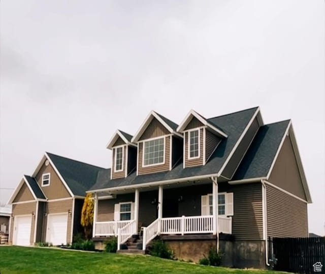 35 E 400 N, Moroni, UT 84646 - craftsman house featuring covered porch, fence, and a front lawn