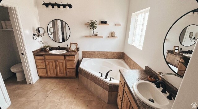 35 E 400 N, Moroni, UT 84646 - bathroom with a sink, tile patterned flooring, a garden tub, and two vanities