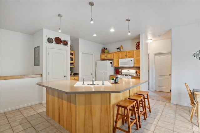 3072 S 1065 W, Syracuse, UT 84075 - kitchen featuring white appliances, a sink, light tile patterned flooring, baseboards, and a large island