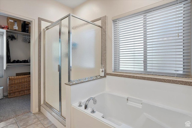 3072 S 1065 W, Syracuse, UT 84075 - full bath with a stall shower, a garden tub, tile patterned floors, and a walk in closet