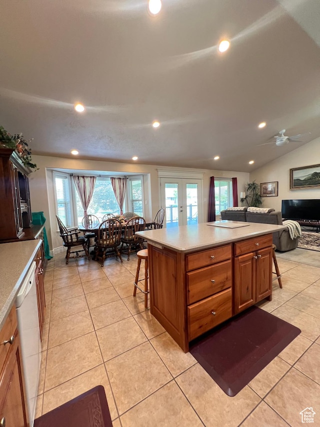1003 E 200 S, American Fork, UT 84003 - kitchen with a kitchen breakfast bar, white dishwasher, healthy amount of natural light, light countertops, and recessed lighting