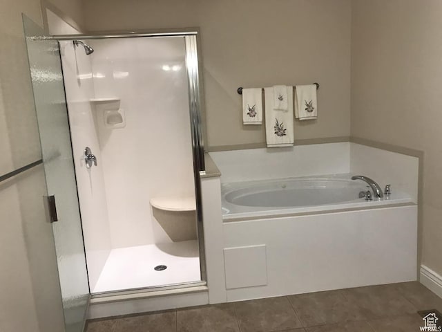 1003 E 200 S, American Fork, UT 84003 - full bathroom with a shower stall, a garden tub, and tile patterned flooring