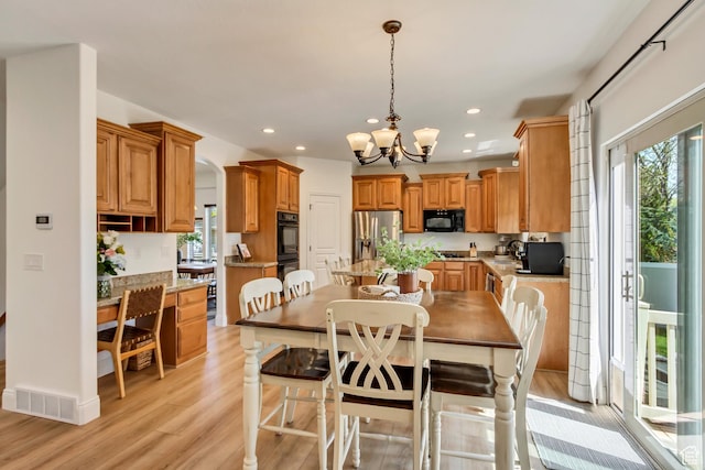 3381 W Slate View Dr, South Jordan, UT 84095 - dining area with recessed lighting, visible vents, a healthy amount of sunlight, and light wood-type flooring