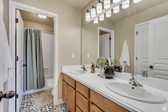3381 W Slate View Dr, South Jordan, UT 84095 - bathroom featuring double vanity, a sink, tile patterned flooring, and toilet