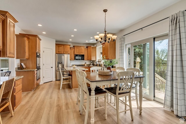 3381 W Slate View Dr, South Jordan, UT 84095 - dining space featuring an inviting chandelier, recessed lighting, and light wood-style flooring