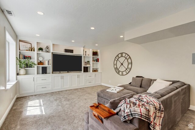 3381 W Slate View Dr, South Jordan, UT 84095 - living area with baseboards, plenty of natural light, and light carpet