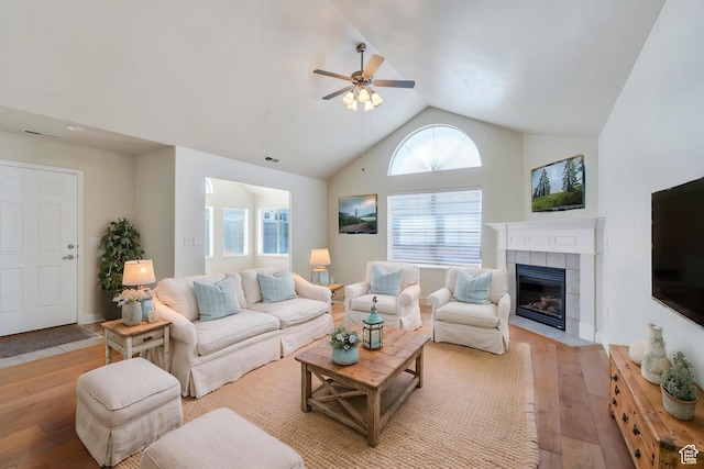 487 W 350 S Unit D, Springville, UT 84663 - living area with light wood-style floors, a ceiling fan, visible vents, and a tile fireplace