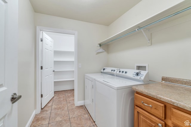 487 W 350 S Unit D, Springville, UT 84663 - laundry room with light tile patterned floors, baseboards, and independent washer and dryer