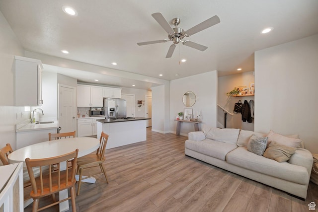 825 S 1710 E, Spanish Fork, UT 84660 - living area with baseboards, recessed lighting, ceiling fan, and light wood-style flooring