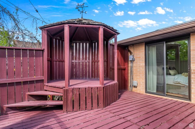 6888 S 455 E, Midvale, UT 84047 - wooden terrace featuring a hot tub
