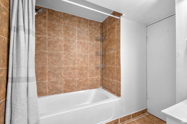 6888 S 455 E, Midvale, UT 84047 - bathroom featuring tile patterned flooring and shower / bath combination with curtain