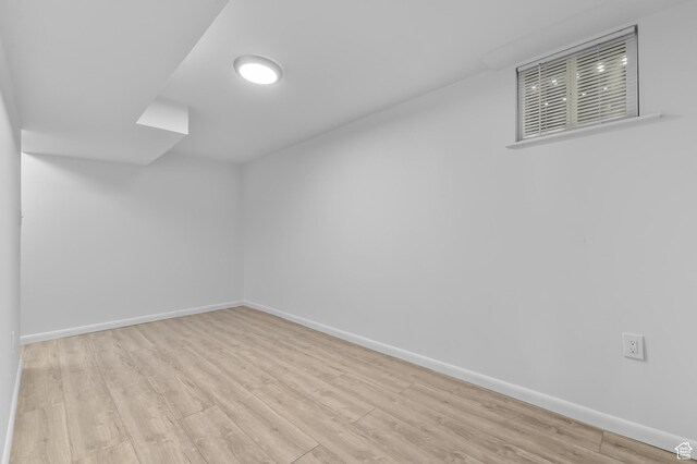 6888 S 455 E, Midvale, UT 84047 - additional living space featuring visible vents, baseboards, and wood finished floors