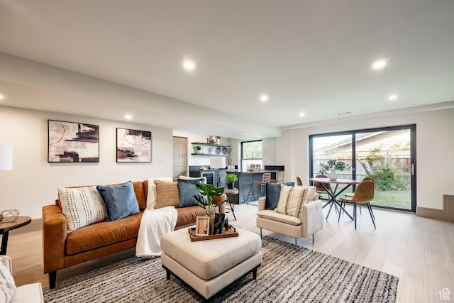 2568 E Sherwood Dr, Salt Lake City, UT 84108 - living room with recessed lighting, baseboards, and light wood-type flooring