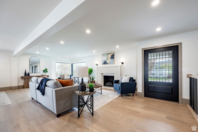 2568 E Sherwood Dr, Salt Lake City, UT 84108 - living area featuring recessed lighting, baseboards, light wood-type flooring, and a fireplace