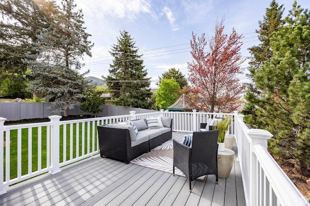 2568 E Sherwood Dr, Salt Lake City, UT 84108 - wooden deck featuring a lawn, an outdoor living space, and a fenced backyard