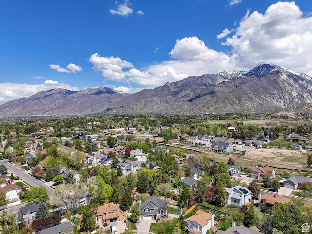 aerial view with a mountain view and a residential view