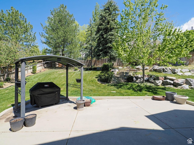 view of patio / terrace with a gazebo and fence