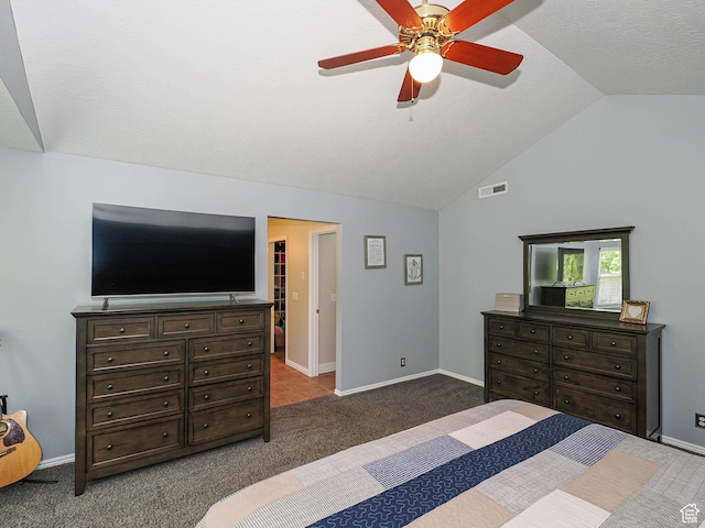 carpeted bedroom with baseboards, ceiling fan, lofted ceiling, and visible vents