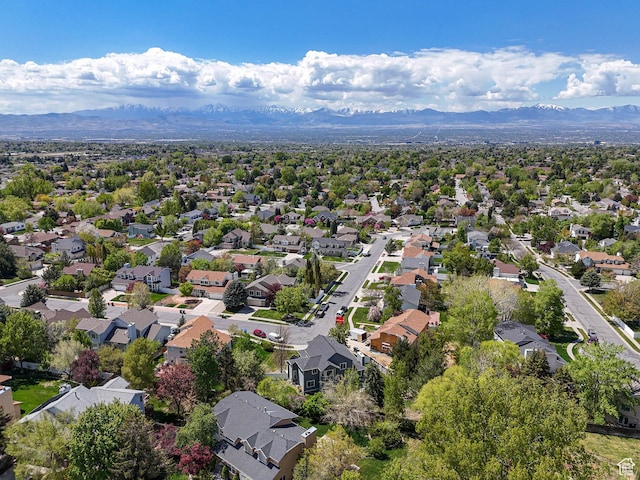 drone / aerial view with a residential view and a mountain view