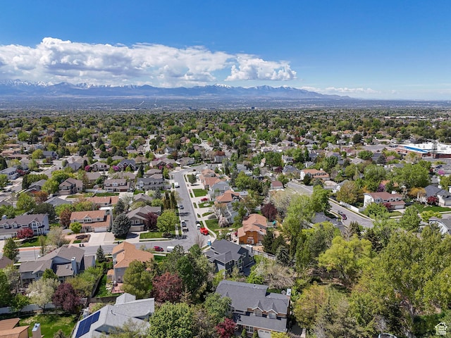 drone / aerial view with a residential view and a mountain view