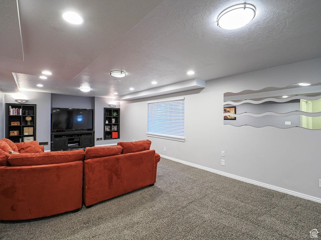 carpeted living area with baseboards and recessed lighting