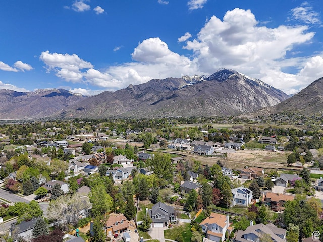 drone / aerial view with a residential view and a mountain view