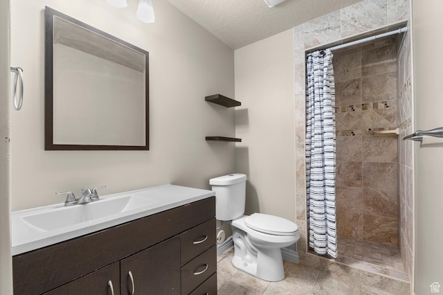 2135 N 130 W, Tooele, UT 84074 - bathroom with vanity, a shower stall, toilet, and a textured ceiling