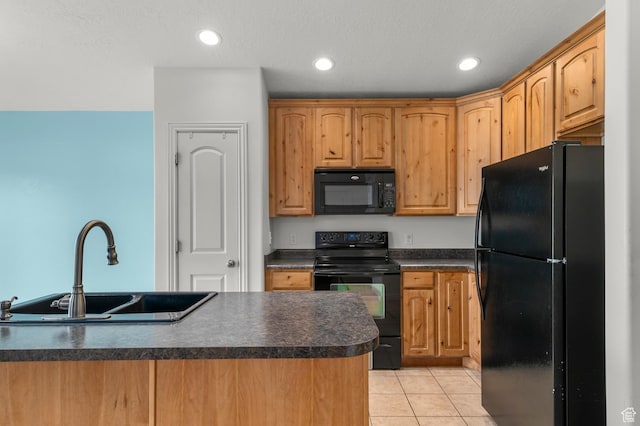 2135 N 130 W, Tooele, UT 84074 - kitchen with light tile patterned flooring, dark countertops, recessed lighting, a sink, and black appliances