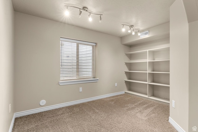 2135 N 130 W, Tooele, UT 84074 - spare room with carpet floors, baseboards, and visible vents