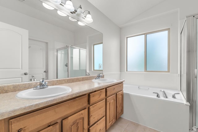 2135 N 130 W, Tooele, UT 84074 - bathroom featuring double vanity, vaulted ceiling, a sink, and a stall shower
