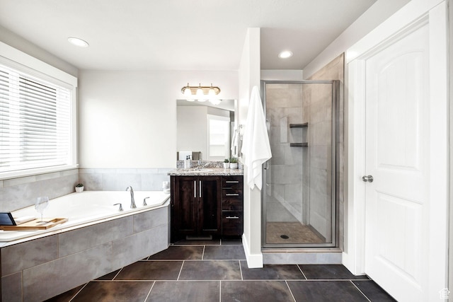 590 S 1030 E, Smithfield, UT 84335 - bathroom featuring a garden tub, vanity, recessed lighting, tile patterned floors, and a shower stall