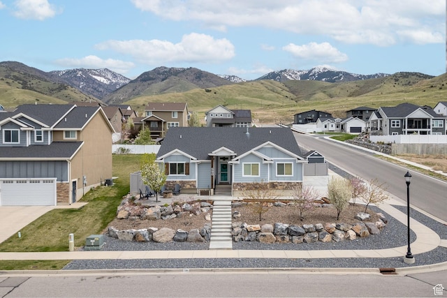 590 S 1030 E, Smithfield, UT 84335 - view of front of property featuring a residential view, board and batten siding, and stone siding