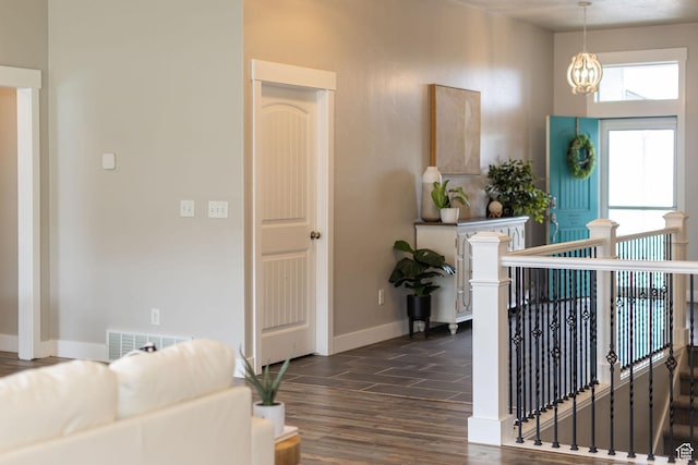 590 S 1030 E, Smithfield, UT 84335 - interior space featuring a notable chandelier, visible vents, baseboards, and dark wood-type flooring