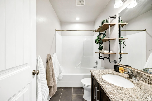 590 S 1030 E, Smithfield, UT 84335 - full bath featuring visible vents, tile patterned flooring, vanity, toilet, and washtub / shower combination