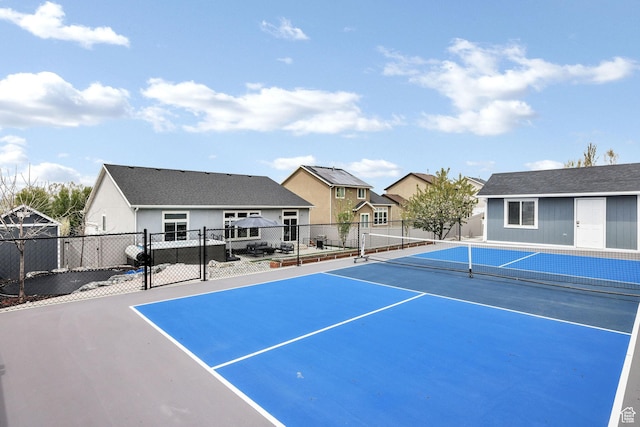 590 S 1030 E, Smithfield, UT 84335 - view of tennis court with fence and a residential view