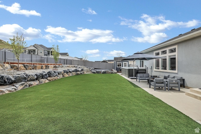 590 S 1030 E, Smithfield, UT 84335 - view of yard featuring a fenced backyard, outdoor lounge area, a patio area, and a residential view
