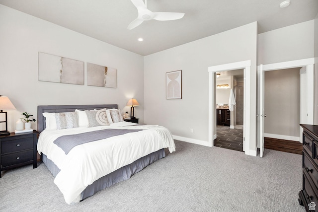 590 S 1030 E, Smithfield, UT 84335 - bedroom with baseboards, ceiling fan, light carpet, and ensuite bathroom