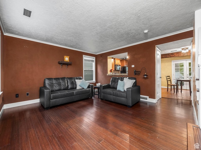 1286 W Glenbarr, Springville, UT 84663 - living room featuring crown molding, wood-type flooring, a textured ceiling, baseboards, and visible vents