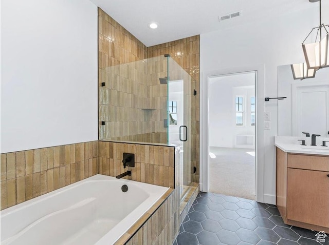 11436 S Watercourse Rd Unit 110, South Jordan, UT 84009 - full bath featuring visible vents, a garden tub, vanity, tile patterned floors, and a stall shower