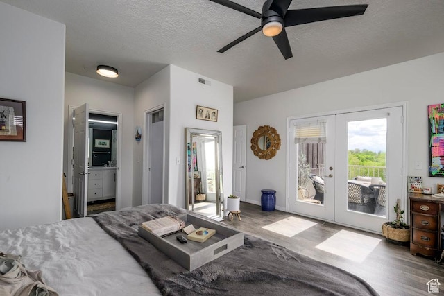 5012 S Tiimber Way Unit 415, Holladay, UT 84117 - bedroom with access to outside, french doors, a ceiling fan, wood finished floors, and visible vents