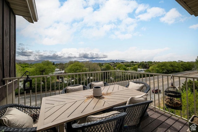 5012 S Tiimber Way Unit 415, Holladay, UT 84117 - balcony with a mountain view and outdoor dining space