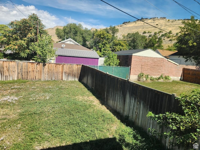 268 W 700 N, Salt Lake City, UT 84103 - view of yard with a mountain view and a fenced backyard