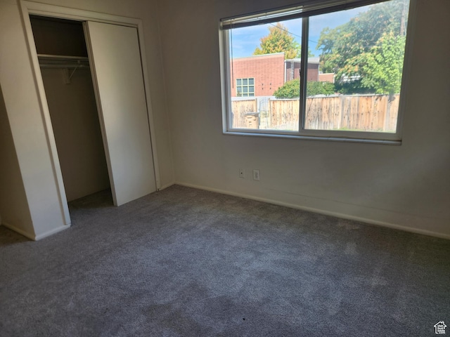 268 W 700 N, Salt Lake City, UT 84103 - unfurnished bedroom featuring baseboards, carpet, and a closet