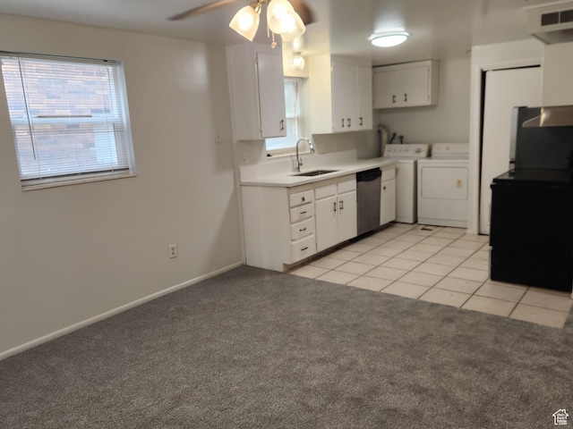 268 W 700 N, Salt Lake City, UT 84103 - kitchen with stainless steel dishwasher, a sink, washer and dryer, and light colored carpet