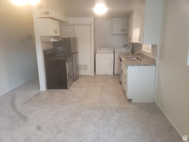 268 W 700 N, Salt Lake City, UT 84103 - kitchen with visible vents, light colored carpet, white cabinets, separate washer and dryer, and a sink