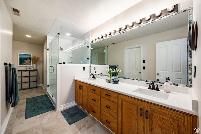 10944 S Surrey Meadow Cv, South Jordan, UT 84095 - full bathroom featuring double vanity, a stall shower, and baseboards