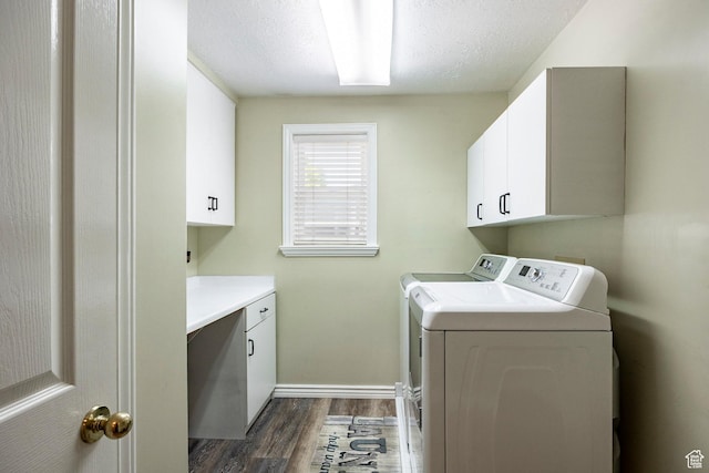 10944 S Surrey Meadow Cv, South Jordan, UT 84095 - laundry room featuring washer and dryer, cabinet space, dark wood finished floors, baseboards, and a textured ceiling