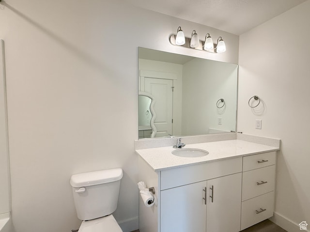 1776 N 300 E Unit 106, North Ogden, UT 84414 - bathroom featuring toilet, baseboards, and vanity